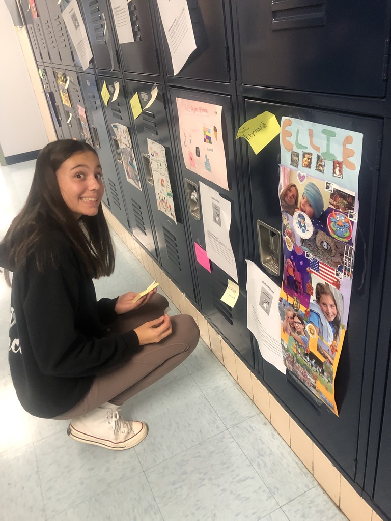 WEB Leader adding positive notes to lockers