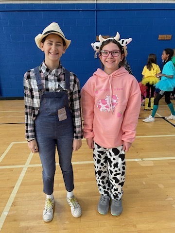 Students dressed as farmer and cow