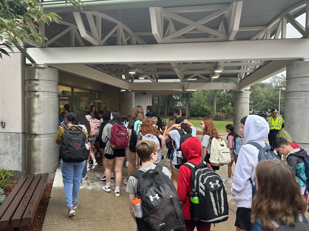 Students entering the building on the first day of school.